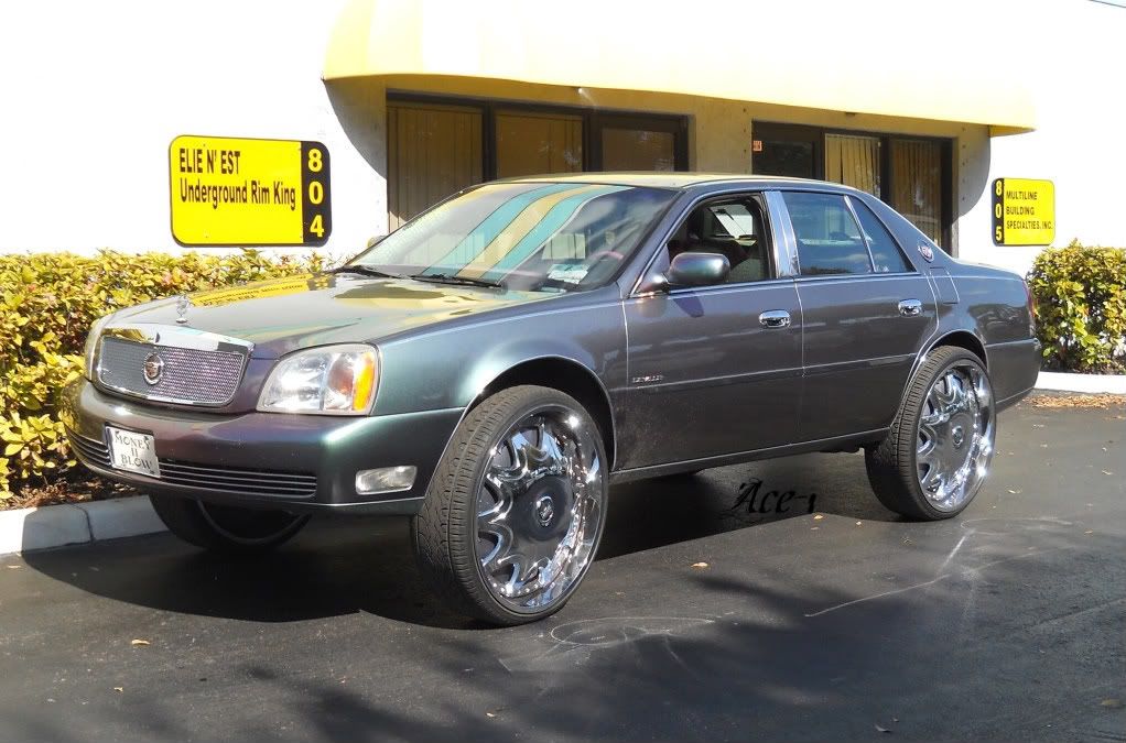 02 Cadillac deville on 26s